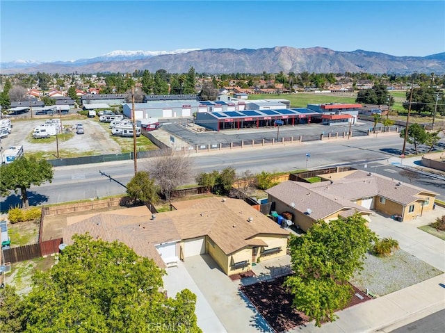 drone / aerial view featuring a mountain view and a residential view