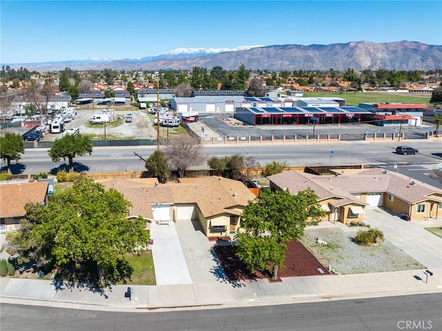 bird's eye view featuring a residential view and a mountain view