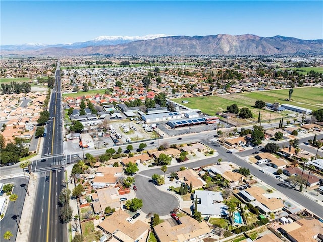 birds eye view of property with a residential view and a mountain view