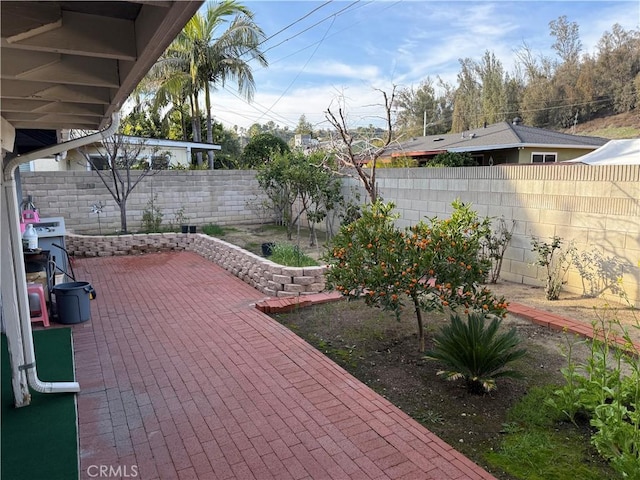 view of patio / terrace featuring a fenced backyard