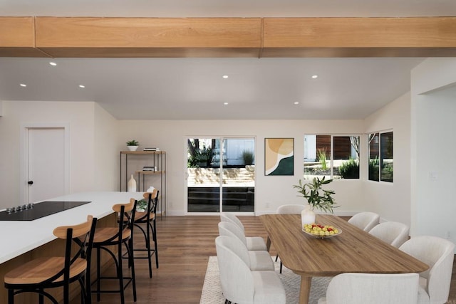 dining space featuring recessed lighting, vaulted ceiling with beams, baseboards, and wood finished floors