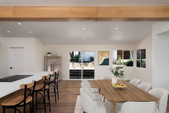 dining room with recessed lighting, baseboards, and wood finished floors