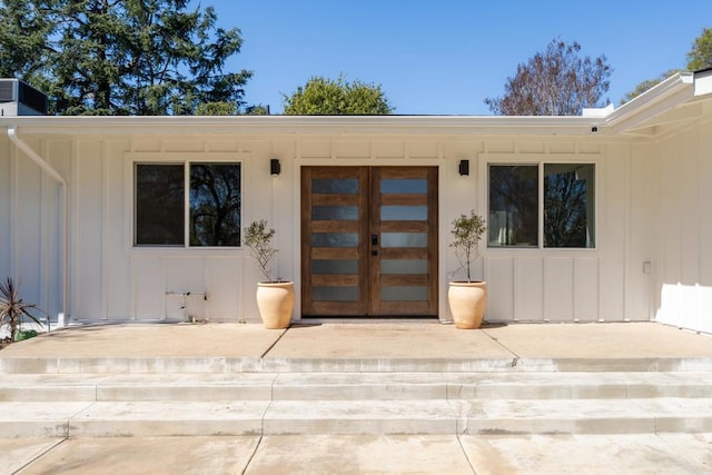 1743 Green Briar Cir, Fallbrook, CA 92028 - doorway to property with board and batten siding and french doors