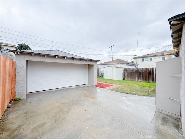 detached garage with fence