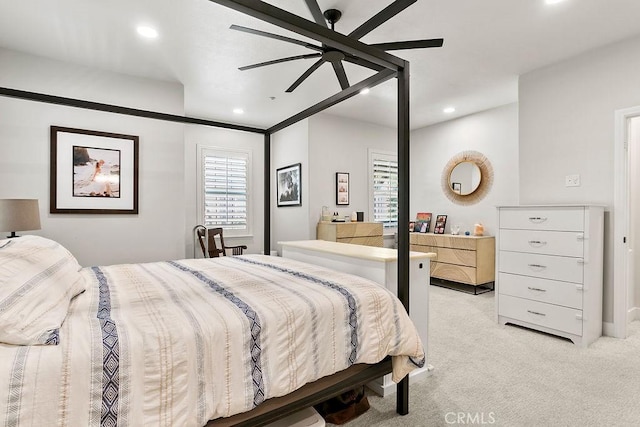 bedroom with recessed lighting, light colored carpet, and ceiling fan