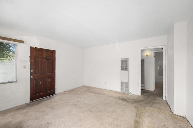 empty room with carpet flooring