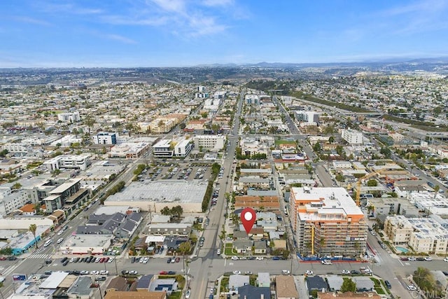 birds eye view of property featuring a city view