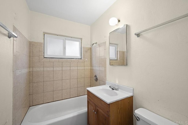 full bathroom featuring vanity,  shower combination, and toilet