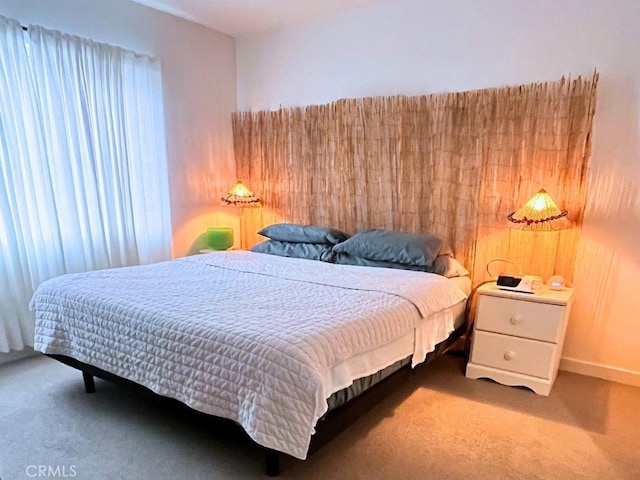 bedroom featuring carpet flooring