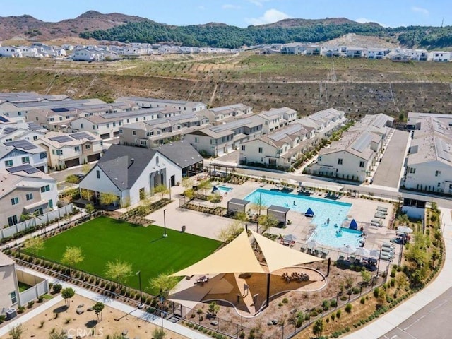 drone / aerial view featuring a mountain view and a residential view