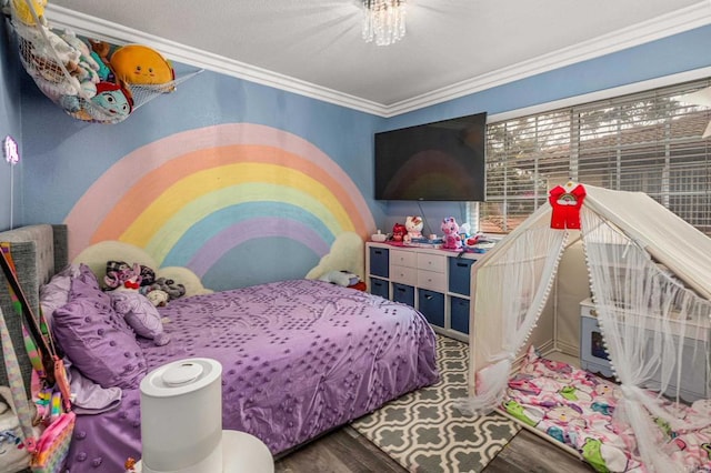 bedroom featuring wood finished floors and ornamental molding