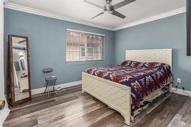 bedroom with a ceiling fan, crown molding, baseboards, and wood finished floors