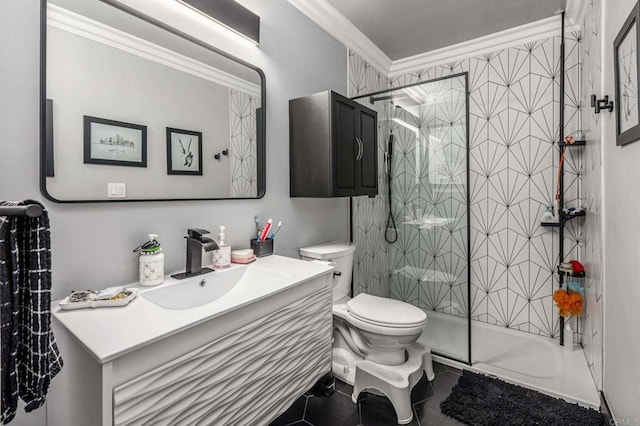 bathroom featuring toilet, ornamental molding, a shower stall, tile patterned flooring, and vanity