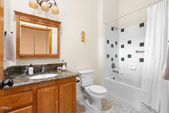 full bath featuring tile patterned floors, toilet, shower / bath combo, a chandelier, and vanity