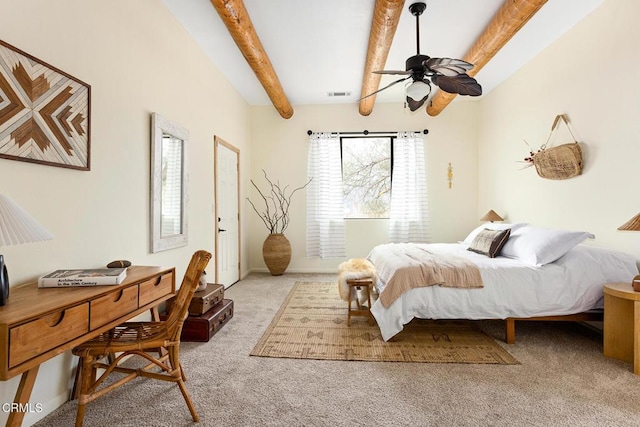 bedroom with visible vents, light carpet, and beam ceiling