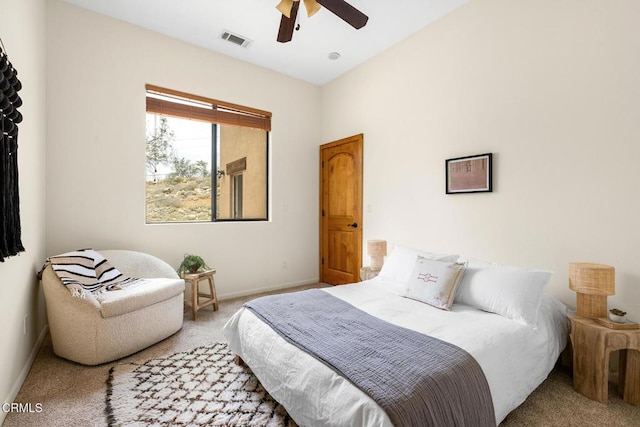 bedroom with visible vents, baseboards, a ceiling fan, and carpet flooring