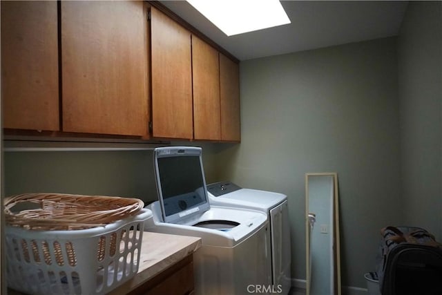 laundry area featuring cabinet space and independent washer and dryer