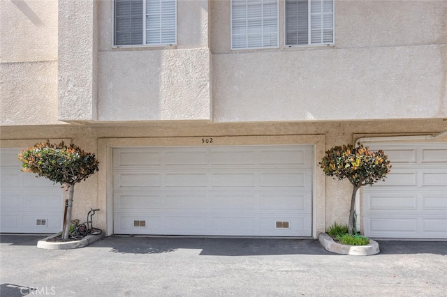 garage featuring visible vents