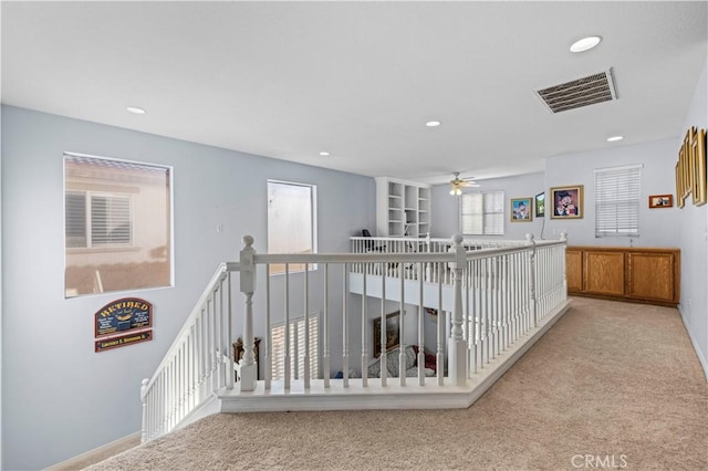 27950 Periwinkle Ln, Valencia, CA 91354 - hallway with an upstairs landing, carpet, and recessed lighting