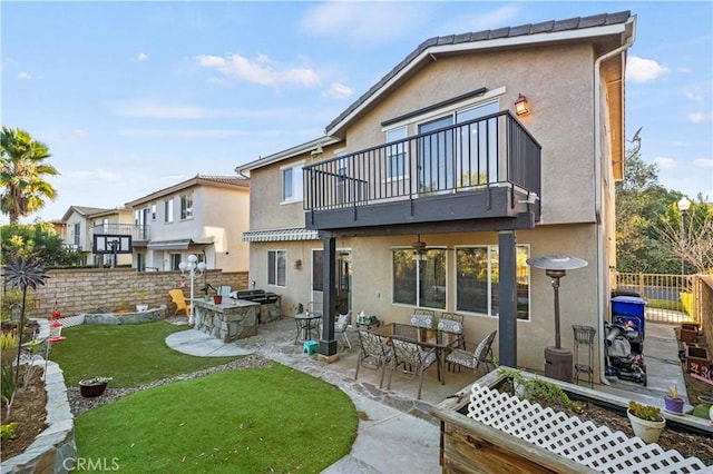 27950 Periwinkle Ln, Valencia, CA 91354 - rear view of property with a balcony, stucco siding, and a fenced backyard