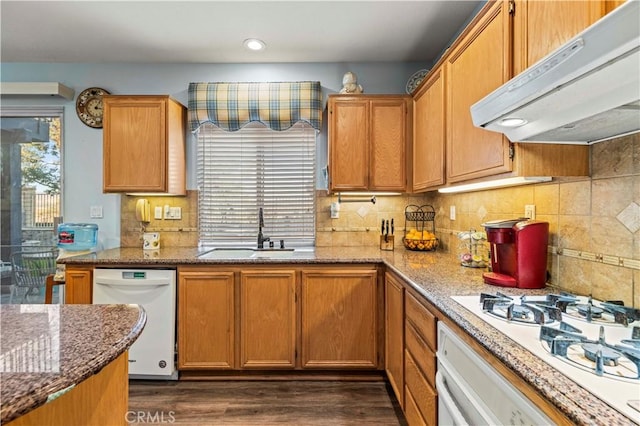 27950 Periwinkle Ln, Valencia, CA 91354 - kitchen with under cabinet range hood, white appliances, dark wood finished floors, recessed lighting, and stone countertops