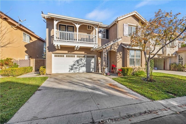 view of front of property with concrete driveway, a front yard, stucco siding, a balcony, and an attached garage