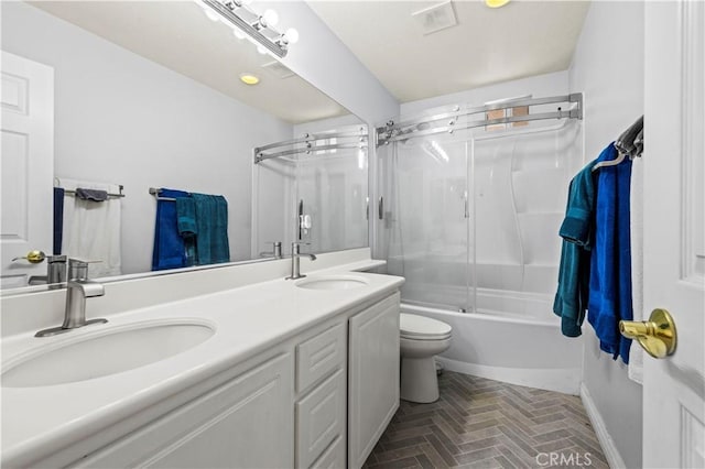 27950 Periwinkle Ln, Valencia, CA 91354 - full bathroom with double vanity, combined bath / shower with glass door, and brick patterned flooring