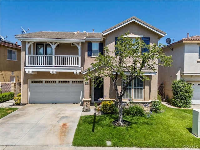 27950 Periwinkle Ln, Valencia, CA 91354 - view of front of house featuring a balcony, stucco siding, an attached garage, and driveway