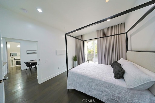 bedroom with lofted ceiling, recessed lighting, baseboards, and dark wood-style flooring