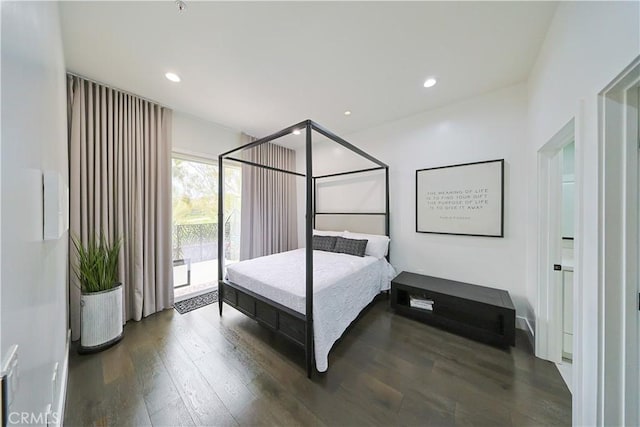 bedroom featuring recessed lighting and wood finished floors