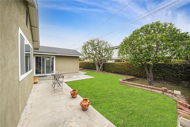 view of yard with a patio area and fence