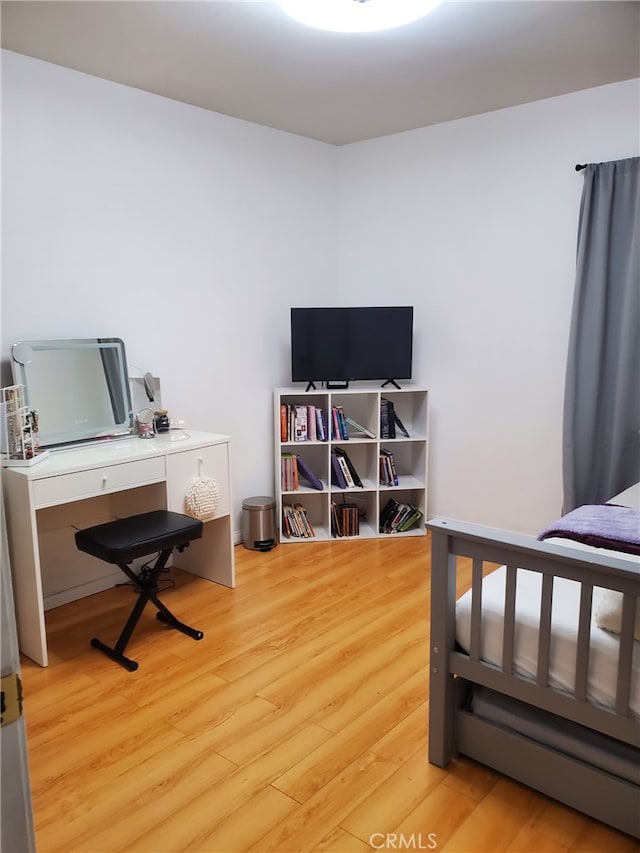 bedroom featuring light wood-type flooring