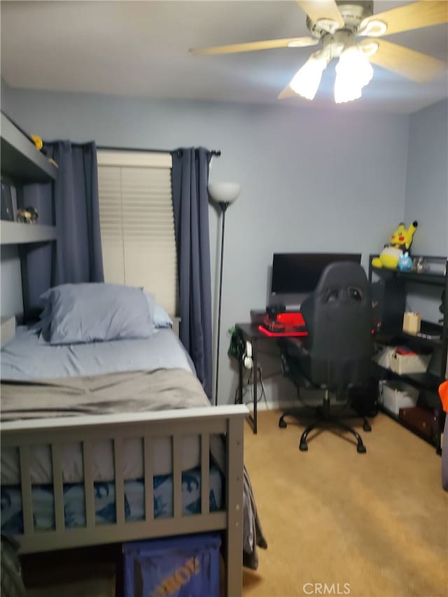 bedroom featuring carpet flooring and a ceiling fan