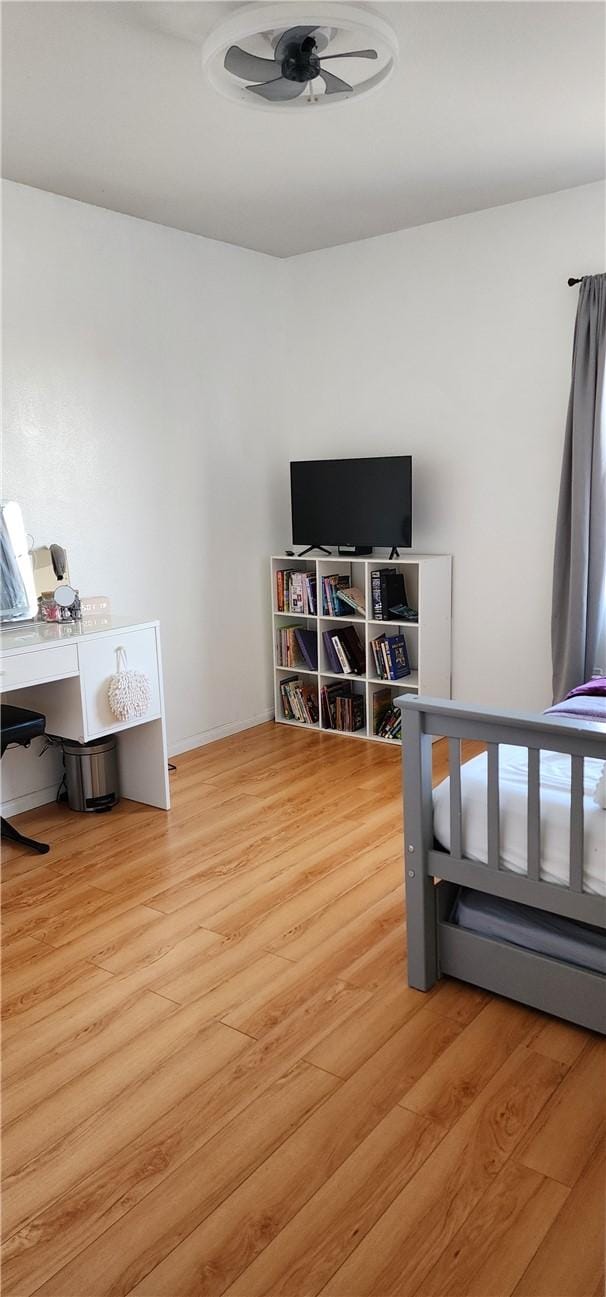 bedroom with light wood-style floors