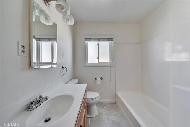 full bath featuring tile patterned flooring, a healthy amount of sunlight, toilet, and vanity