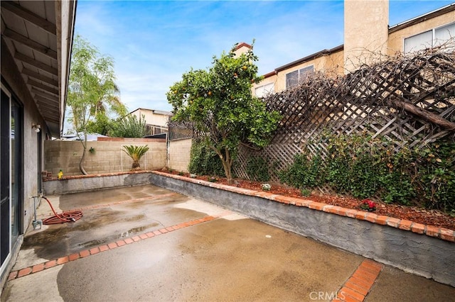 view of patio with a fenced backyard