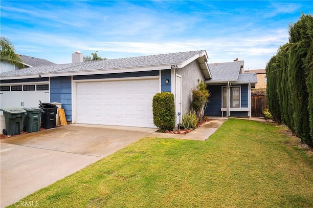 ranch-style home with fence, a front yard, a chimney, a garage, and driveway