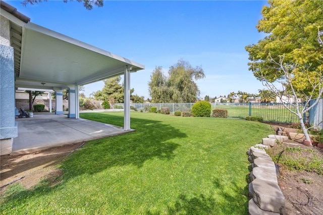 view of yard with a patio area and fence