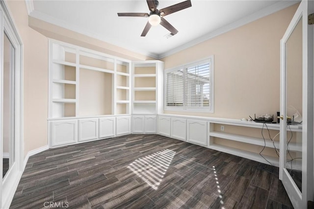 unfurnished dining area with visible vents, dark wood-type flooring, crown molding, and ceiling fan