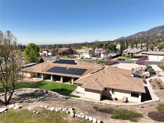 bird's eye view featuring a residential view and a mountain view