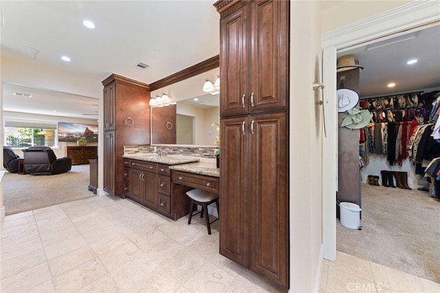 full bath with tasteful backsplash, visible vents, recessed lighting, and vanity