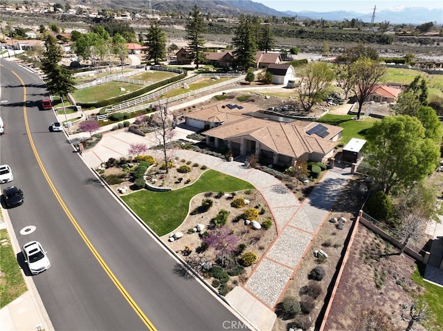 bird's eye view with a mountain view and a residential view