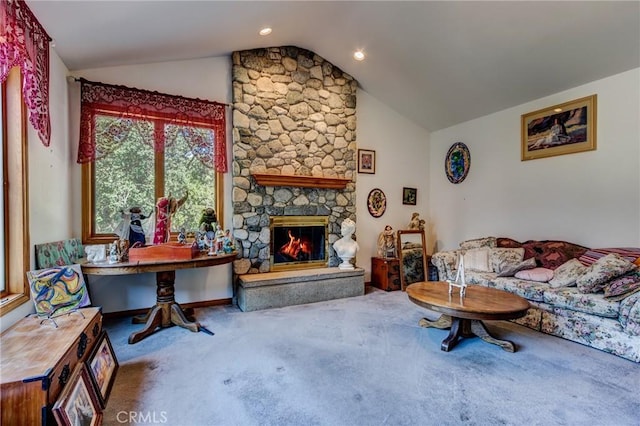 living room featuring vaulted ceiling, carpet flooring, a fireplace, and recessed lighting