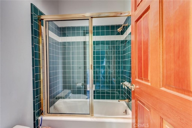 full bathroom featuring shower / bath combination with glass door