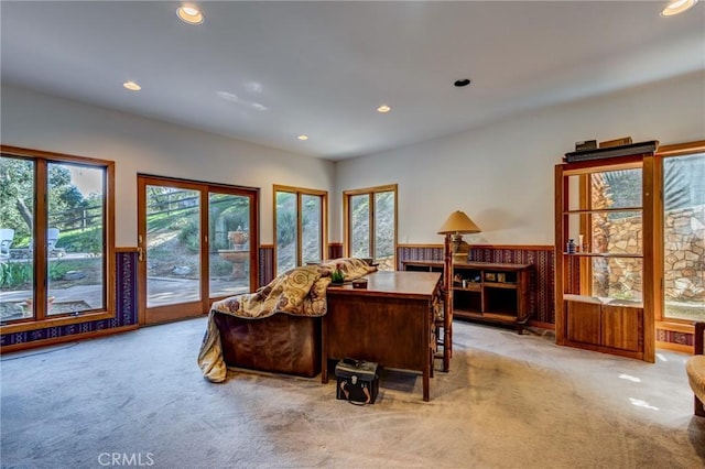 office with light carpet, a wainscoted wall, and recessed lighting