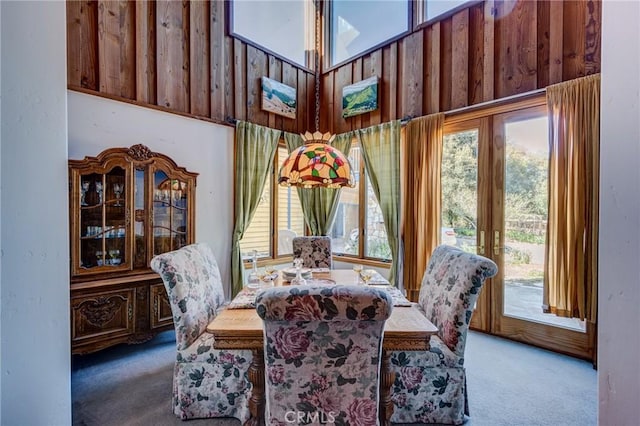 dining area featuring carpet flooring