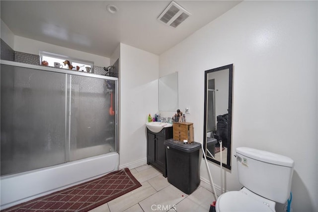 full bath featuring vanity, visible vents, tile patterned floors, toilet, and combined bath / shower with glass door