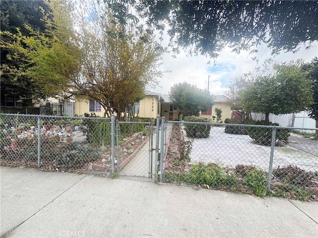 exterior space featuring a fenced front yard