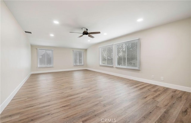 unfurnished room featuring recessed lighting, baseboards, ceiling fan, and light wood finished floors