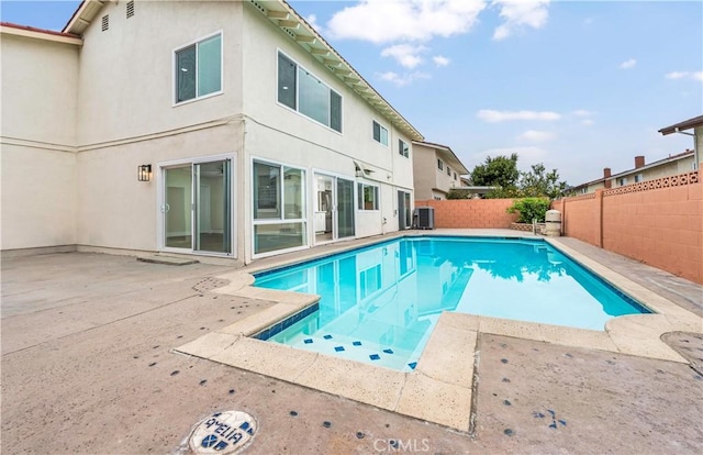 view of pool featuring a patio area, a fenced backyard, and a fenced in pool